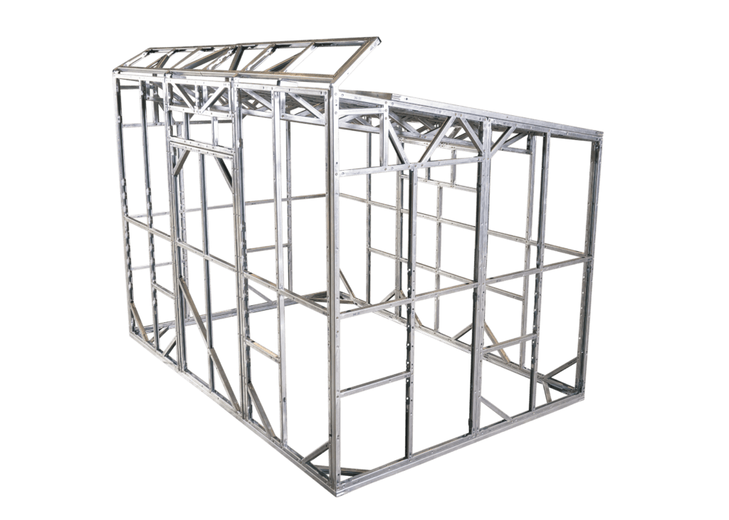 Unfinished steel frame for greenhouse in warehouse by B & T Manufacturing.