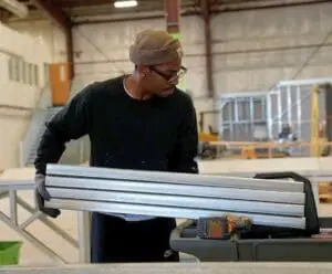 B&T worker putting together a steel frame