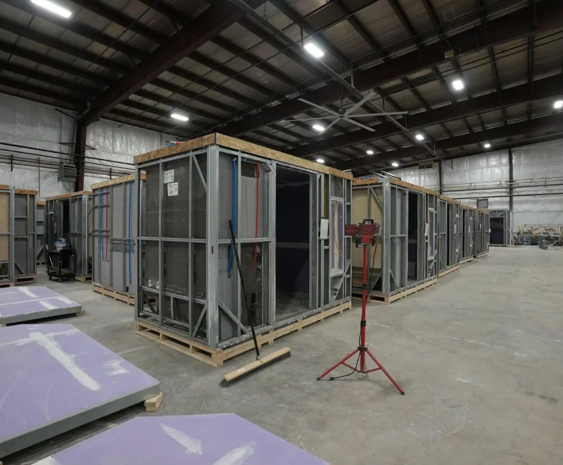 View of multiple in progress modular bathroom pods
