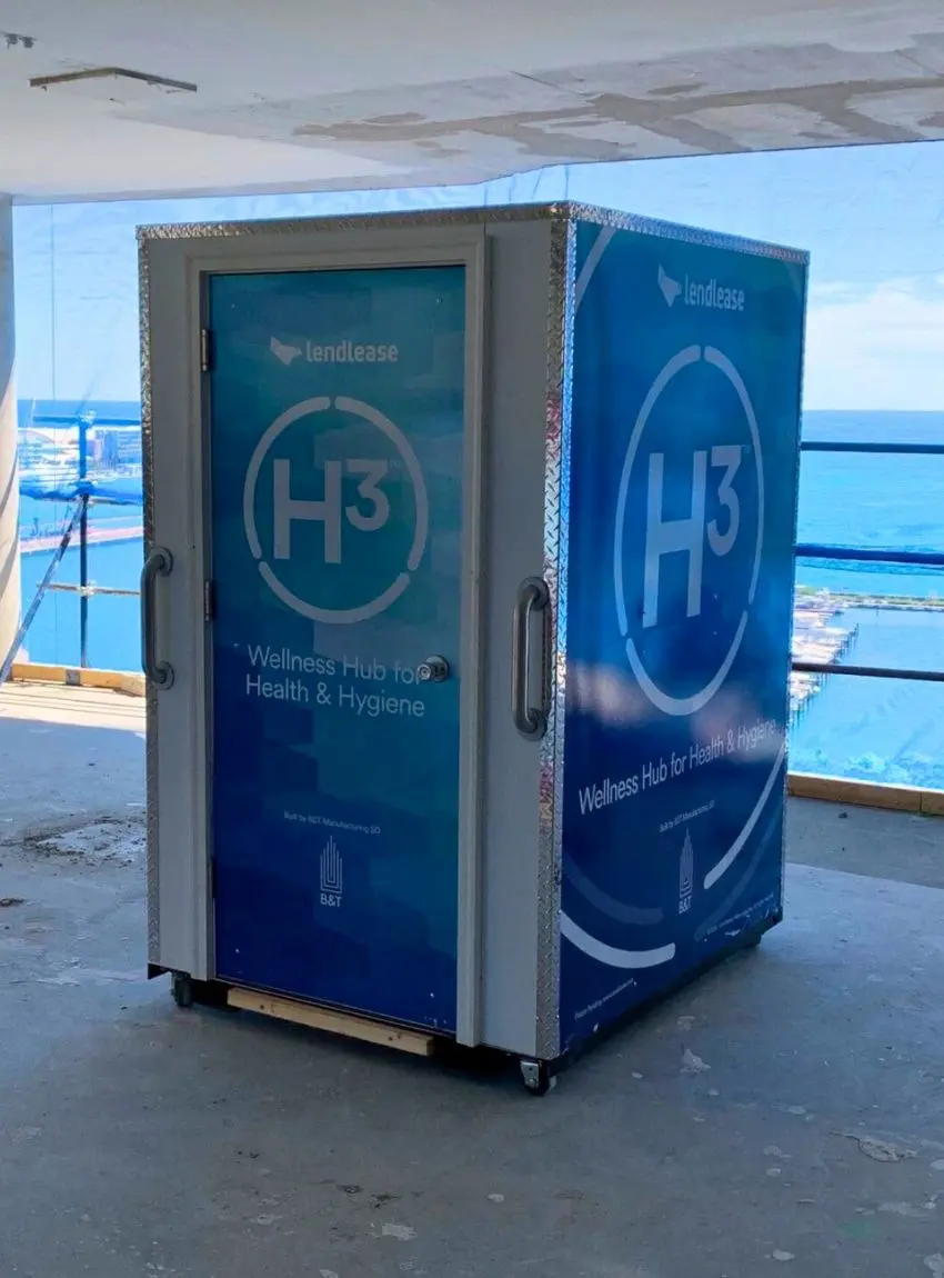 H³ Wellness Pod branded with Lendlease, located at an active job site.