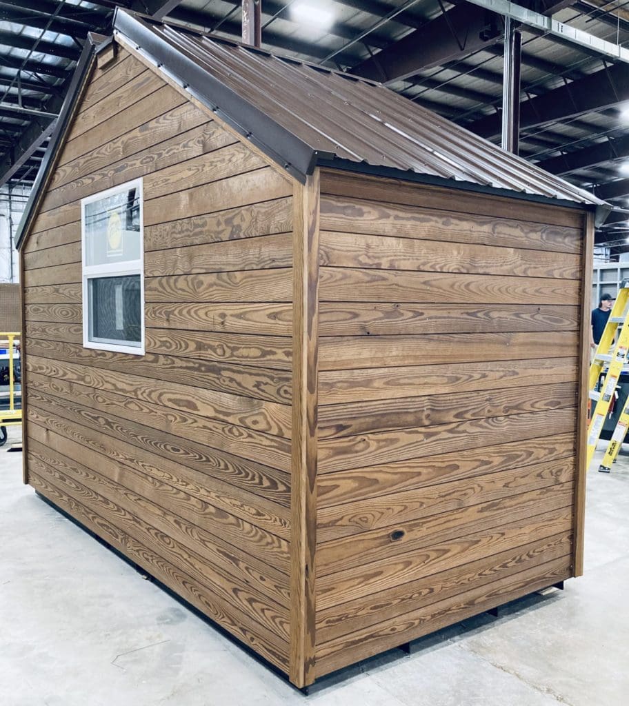 Side view of B & T Manufacturing's latest cabin line.