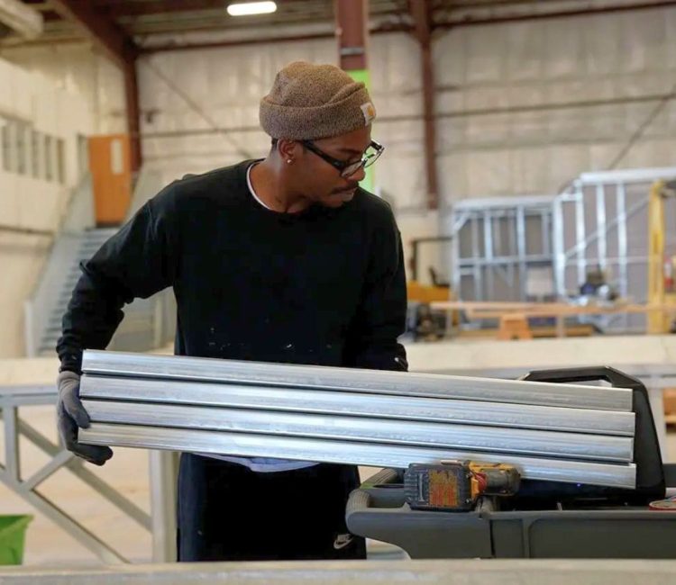B&T worker putting together a steel frame