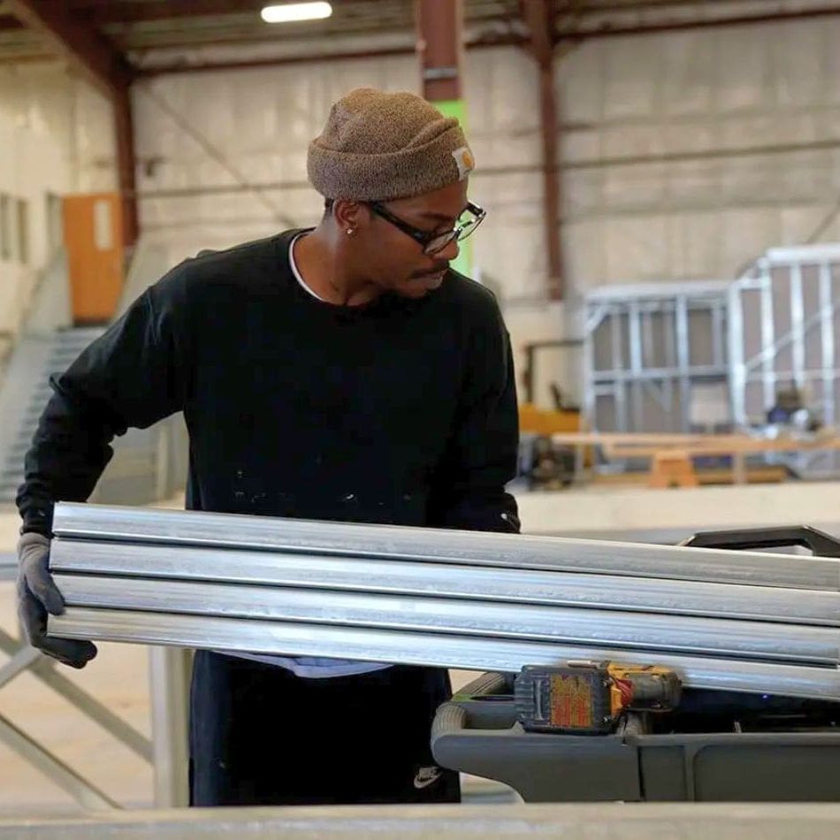 B&T worker putting together a steel frame