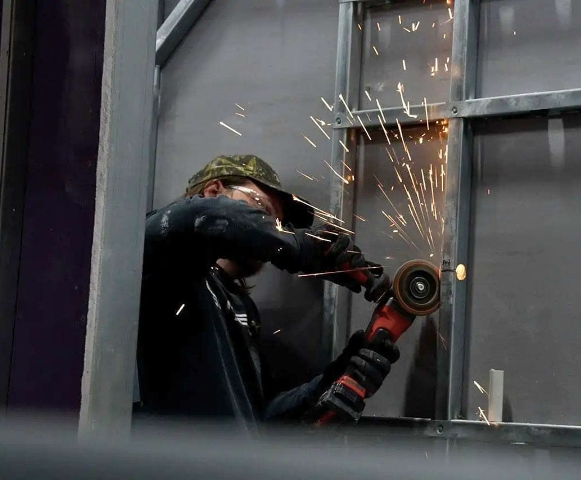 B&T worker working on putting together a steel frame B&T worker working on putting together a steel frame