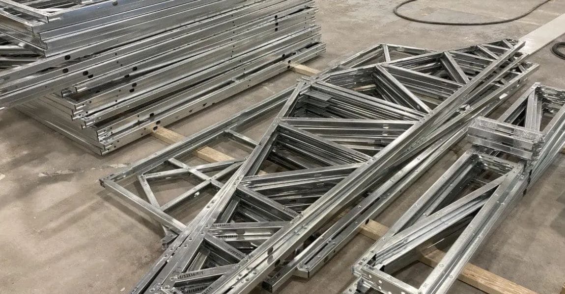 Steel frame pieces ready to be put together Steel frame pieces ready to be put together