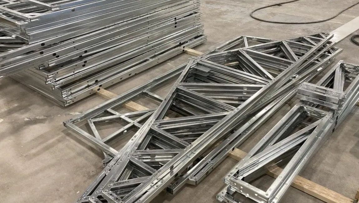 Steel frame pieces ready to be put together Steel frame pieces ready to be put together